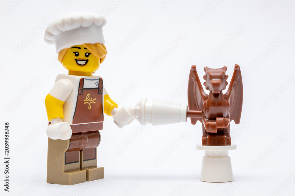 Obraz premium A minifigure of a chocolatier making a chocolate dragon
