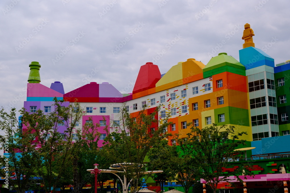 Naklejka premium Shanghai,China-May 30th 2026: Exterior of the Legoland Hotel in Shanghai, building design inspired by colorful Lego bricks