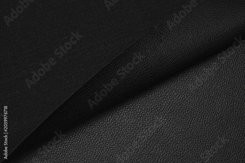 Obraz na płótnie black artificial leather with waves and folds on PVC base