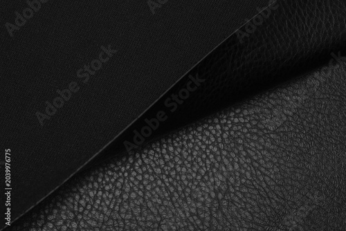 Obraz na płótnie black artificial leather with waves and folds on PVC base