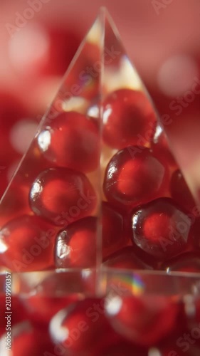 Abstract Macro View of Red Pomegranate Seeds Through Prism