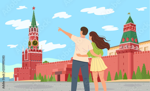 Romantic couple, guy and girl, looking at the Kremlin in Moscow, Red Square, Russia.