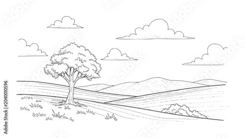 Tableau sur toile Black and white of a lone tree in rolling fields under a cloudy sky landscape na