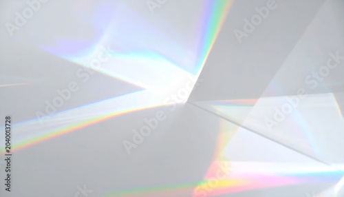 Abstract rainbow light streaks on white.