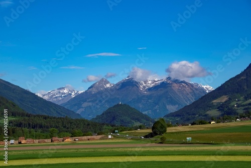 view at the Grossglockner mountain range in a distance from the Carinthia side