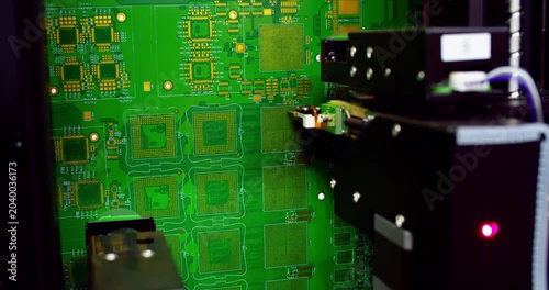 Extreme close-up of a high-tech robotic testing arm conducting quality control on a printed circuit board (PCB). Automated electronics manufacturing, artificial intelligence in industry