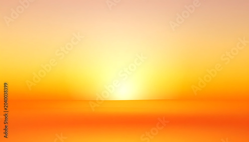 Vibrant sunset over the ocean horizon with warm orange and yellow hues, creating a serene and peaceful atmosphere