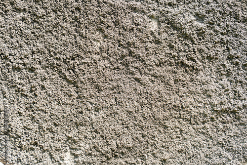Foto Rough textured plaster walls, the grainy, uneven appearance of concrete