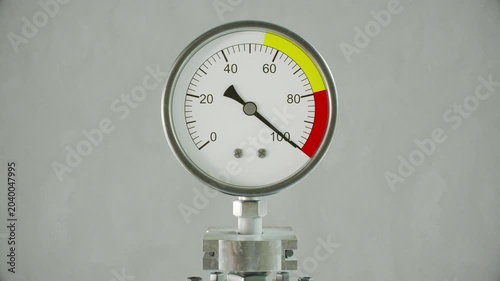 Pressure gauge needle trembling into the red overload zone in a CG animation against a gray background. Industrial safety alerts, geopolitical tension reports, and crisis escalation presentations.