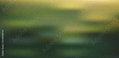 Deep forest green and earthy yellow gradient evoking a serene natural landscape with textured grainy surface