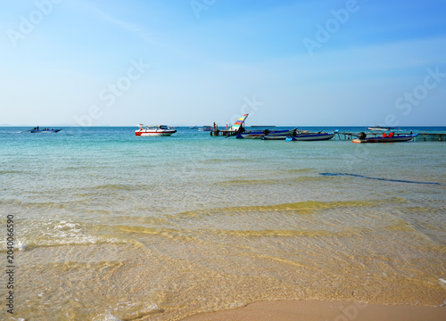 Canvastavla Tropical beach with boats and wooden pier at Star Beach on Phu Quoc Island Beach, Vietnam