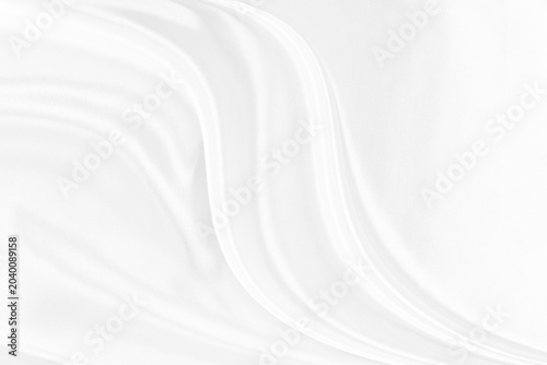 White gray satin texture that is white silver fabric silk background with beautiful soft blur pattern natural.