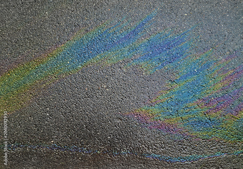 Oil Slick effect on wet rained asphalt