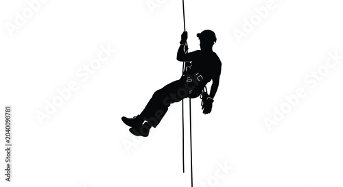 Foto Rappelling climber descending a rope full body view black silhouette