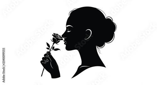 Foto Woman smelling a rose in profile elegant black silhouette