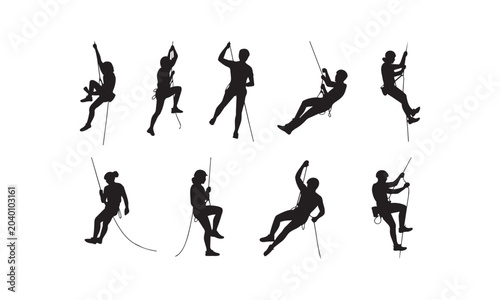 Bild auf Leinwand Detailed black silhouette figures of adventurous rock climbers scaling walls and