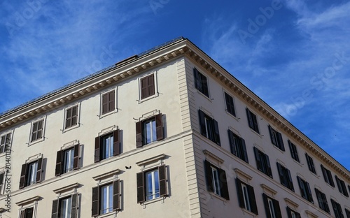 Elegant European Corner Building Under Blue Sky