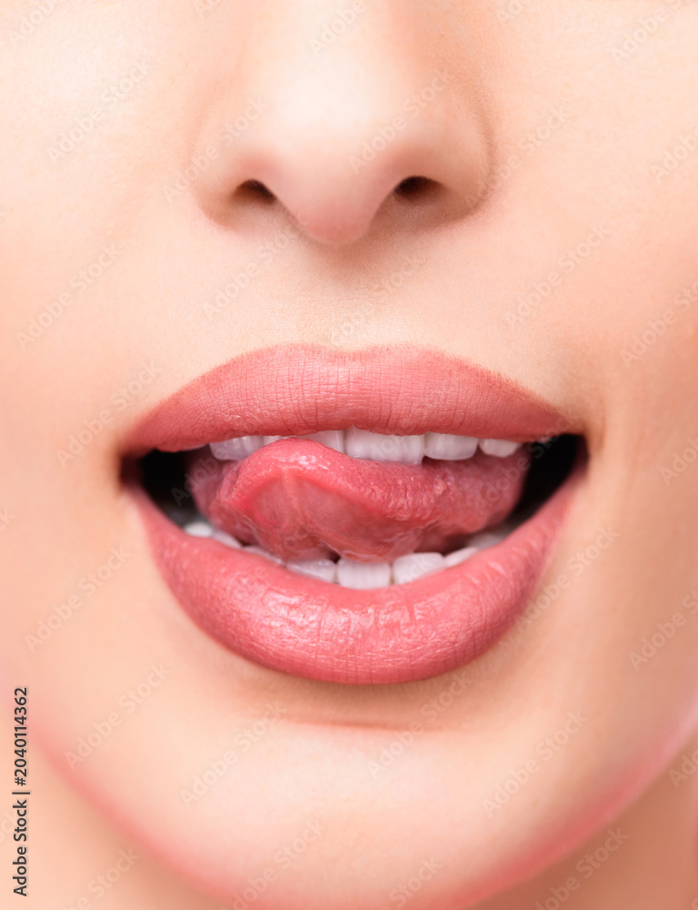 Obraz premium Human lips and tongue in close-up