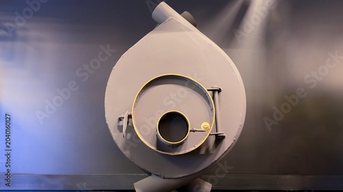 Bilde på lerret Round metal wood burning stove grey steel bullerjan fireplace for alternative ho