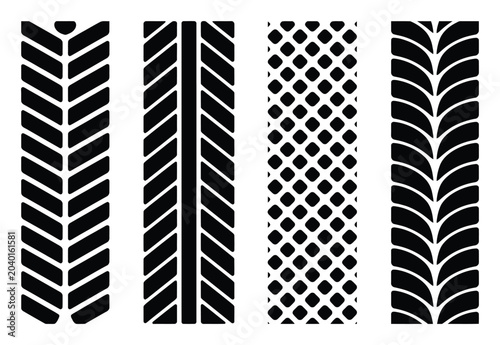 Bild auf Leinwand Four different black tire tread patterns on white background