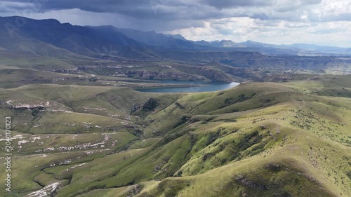Aerial View South Africa Reservoir Under Brewing Storm Clouds Dramatic Overcast Sky Rolling Mountain Ridges