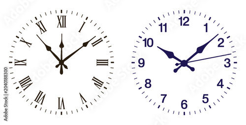 Tableau sur toile Dual Clock Faces: A comparison of Roman and Arabic numerals on clock faces