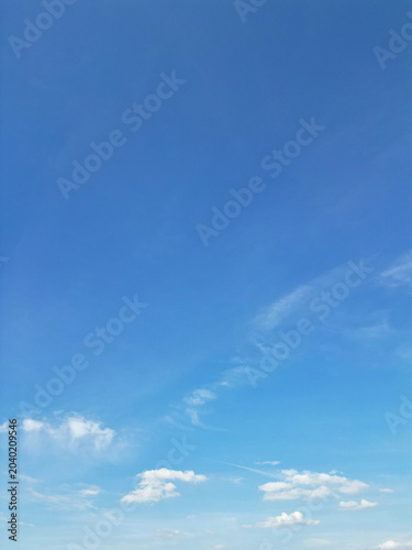 Bright Blue Sky and Some White Clouds over City of England Great Britain During Hot Sunny day. Aerial Footage Was Captured from Medium High Altitude.