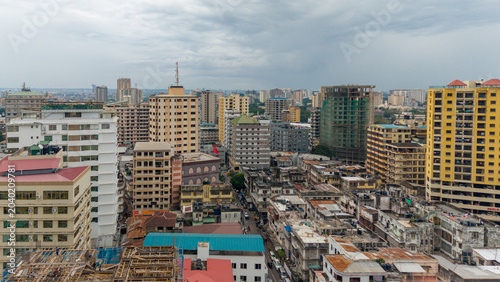Aerial view of Dar es Salaam showcasing modern buildings, urban development, and a dynamic cityscape.