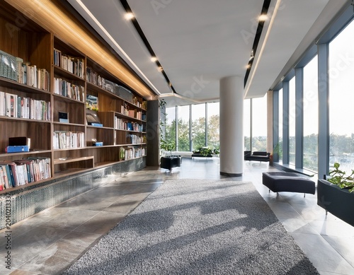 modern lobby with large bookshelf and window