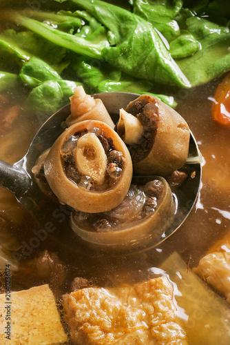Konstfotografi The oxtail soup in the restaurant is a delicious Asian dish.