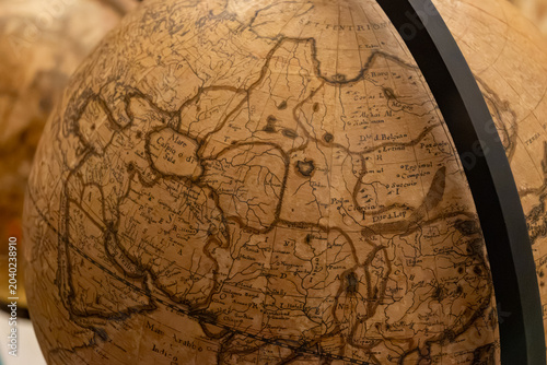 Detailed history of geographical discoveries in Middle Ages, as shown on medieval globes, maps, including ocean voyages and cartography, development of sea routes, discovery continents