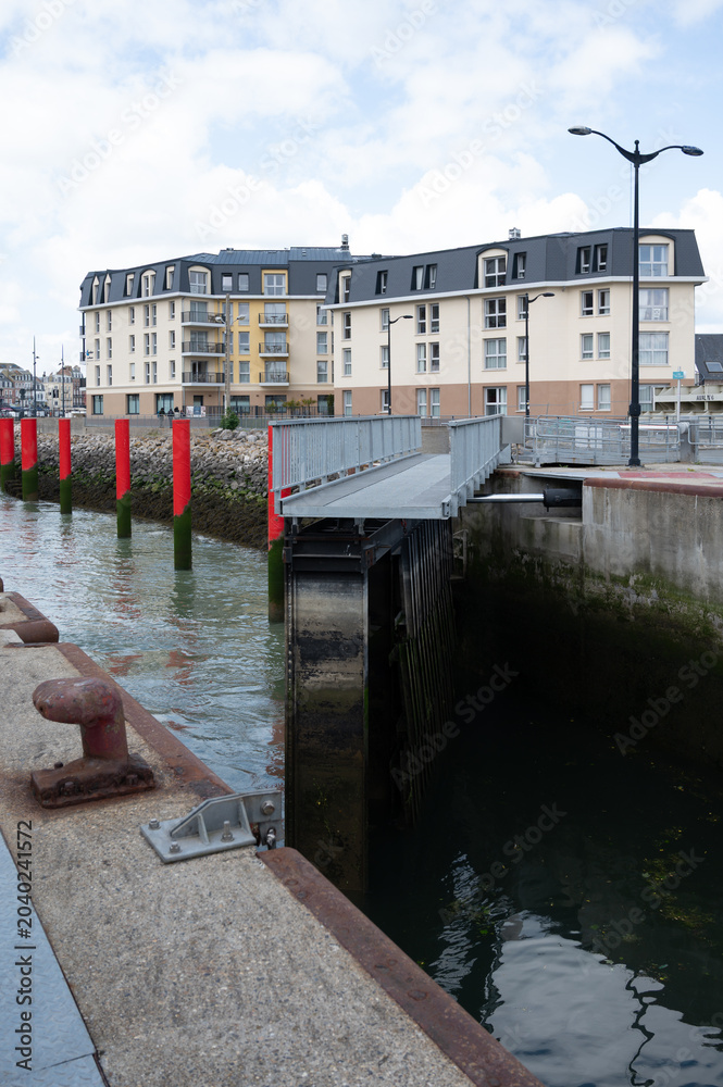 Obraz premium Views of Le Treport, seaside resort in Normandy, France, with white cliffs along English Channel, fishing industry and old buildings, travel destination in France
