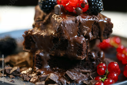 brownies with chocolate and berries