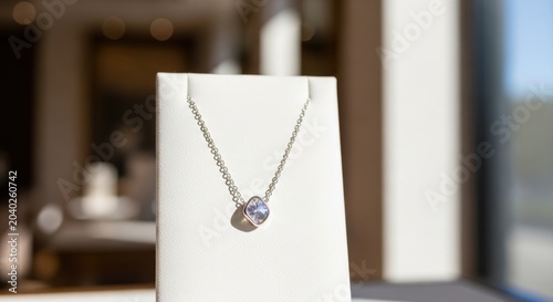 Luxury necklace with purple gemstone on display
