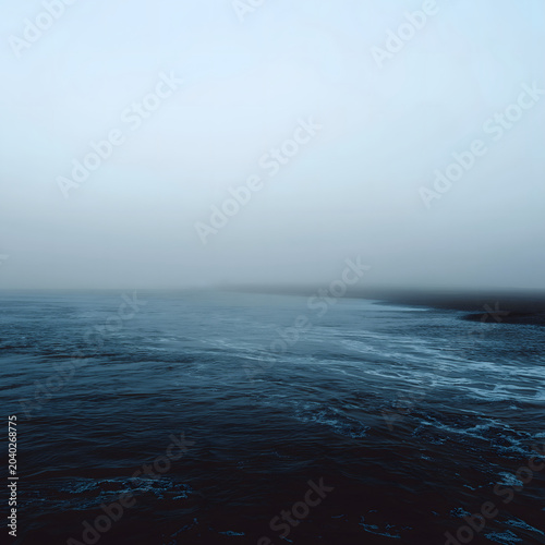 ocean waves and fog