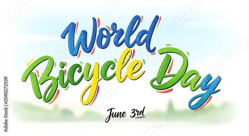Vibrant bicycle day lettering in colorful script with a date of june 3rd, against a soft sky background.keywords: bicycle, day, lettering