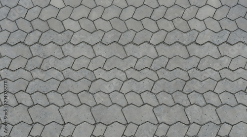 High Angle View of Gray Interlocking Concrete Paving Stones Texture for Urban Walkway Sidewalk and Driveway Landscaping Construction Design