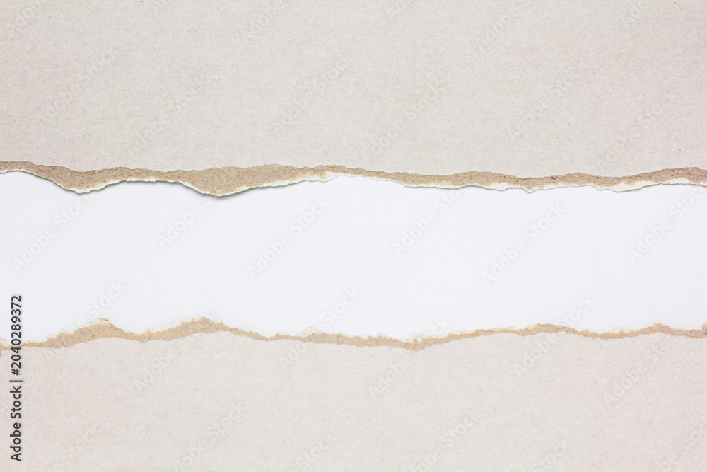 Naklejka premium Tear the paper open, revealing a white background.