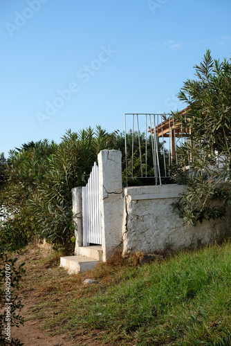 old concrete wall and gate
