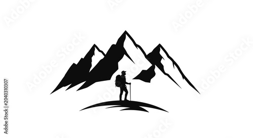 Man standing on mountain peak summit.