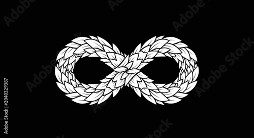 Tableau sur toile White infinity symbol made of layered leaves on a black background