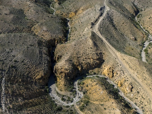 View of hilly landscape with clearly visible unpaved roads, aerial view, Angel's Canyon, canyon, Dashtakar, Ararat Province, Armenia