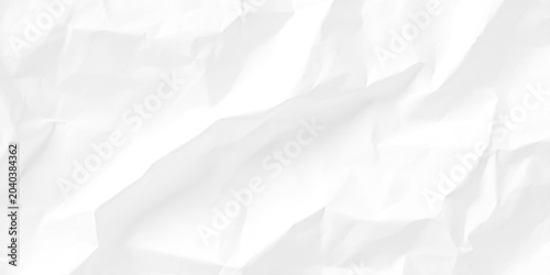 Photos Crumpled white paper texture background with creases and folds