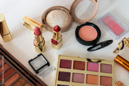 Colorful makeup products arrangement photo