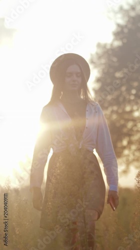 Woman exploring nature during twilight hours, Outdoor female traveler experiencing sunset with vehicle nearby