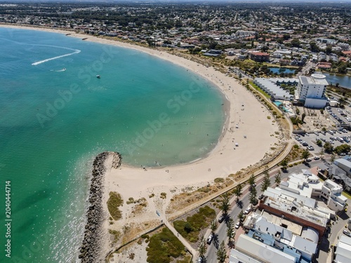 Fotografi Aerial View of Sandy Beach and Coastal Cityscape