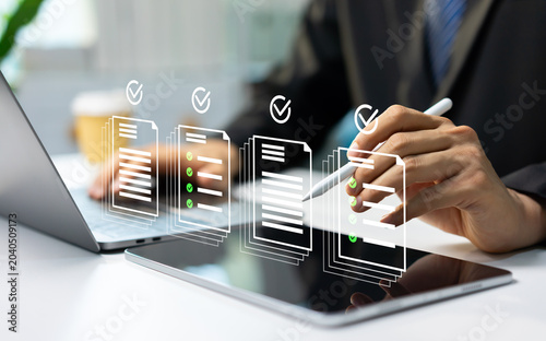 Obraz na płótnie Businessman reviewing document approval process with automated workflow management, legal compliance, and digital business operations