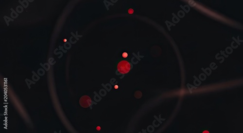 Abstract representation of an atom with orbiting electrons on a dark background.