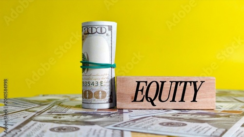 Tableau sur toile A wooden block reading EQUITY sits next to a rolled stack of 100-dollar bills on a bed of cash, set against a solid yellow background