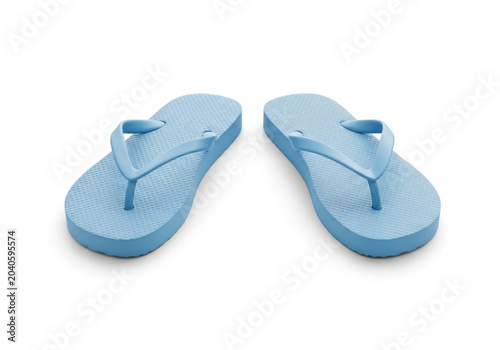 Pair of blue flip flops isolated on white background suitable for summer footwear and casual fashion use